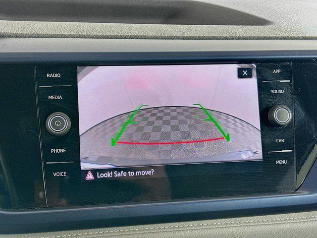 used 2024 Volkswagen Taos car, priced at $18,497