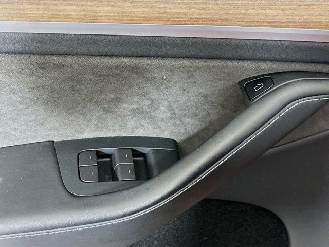 used 2023 Tesla Model Y car, priced at $29,597