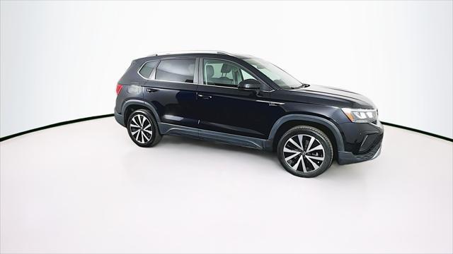 used 2023 Volkswagen Taos car, priced at $18,589