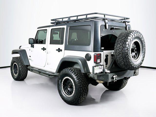 used 2014 Jeep Wrangler Unlimited car, priced at $16,999