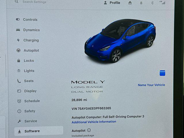 used 2023 Tesla Model Y car, priced at $30,899