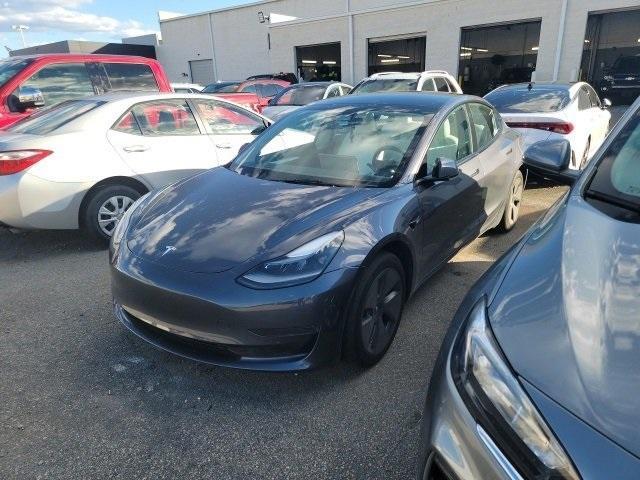 used 2023 Tesla Model 3 car, priced at $28,377