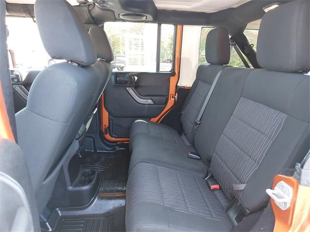 used 2011 Jeep Wrangler Unlimited car, priced at $13,477