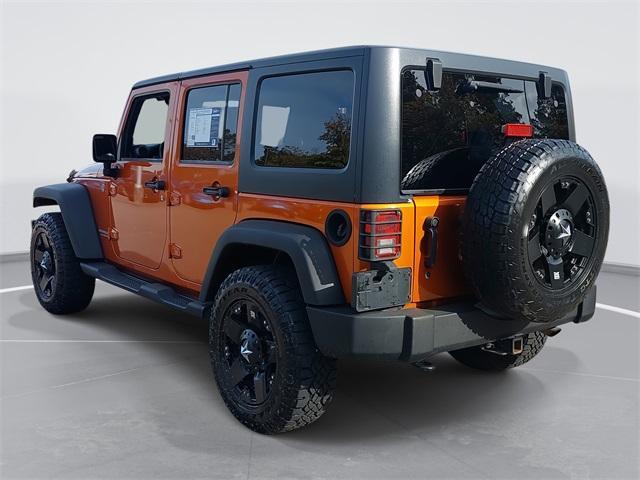 used 2011 Jeep Wrangler Unlimited car, priced at $13,477