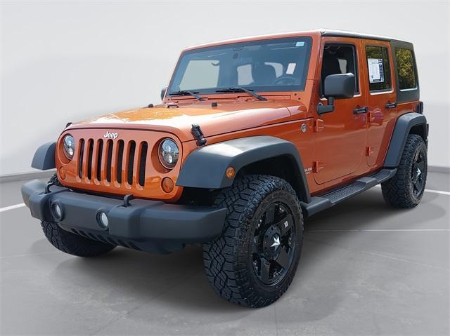 used 2011 Jeep Wrangler Unlimited car, priced at $13,477