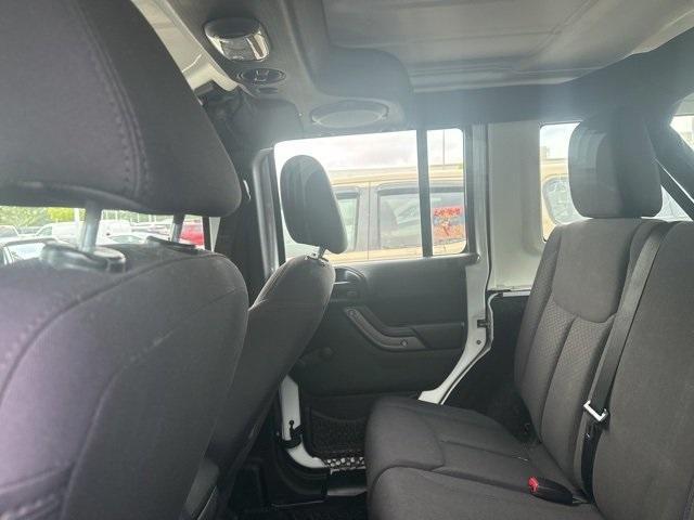 used 2013 Jeep Wrangler Unlimited car, priced at $12,488