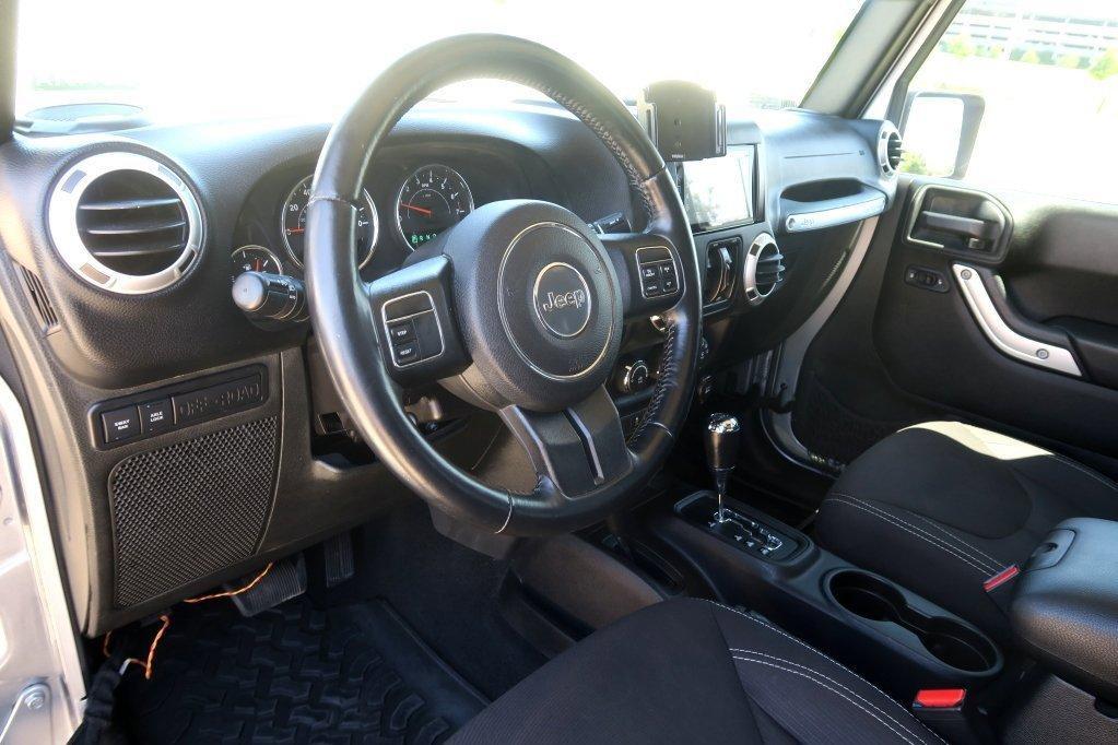 used 2015 Jeep Wrangler Unlimited car, priced at $23,401