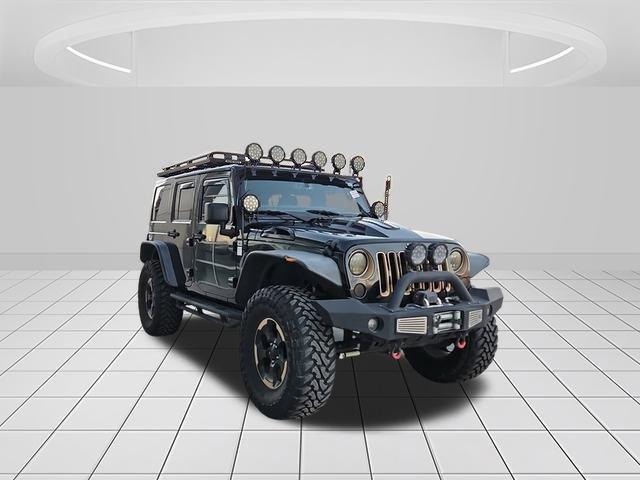 used 2014 Jeep Wrangler Unlimited car, priced at $24,622