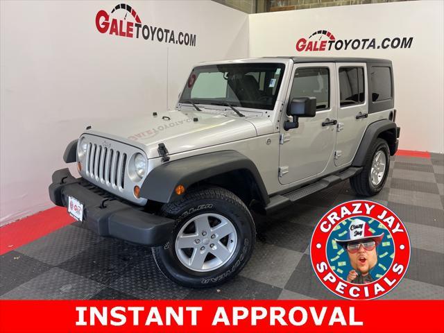 used 2011 Jeep Wrangler Unlimited car, priced at $12,599
