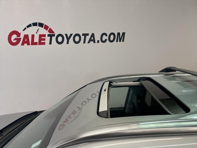 used 2021 Toyota Highlander Hybrid car, priced at $25,980