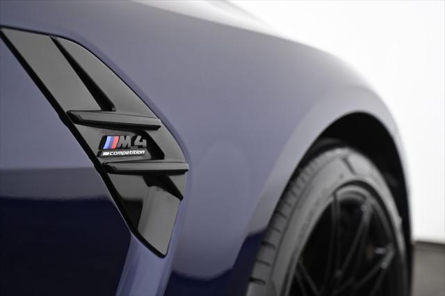 used 2022 BMW M4 car, priced at $65,875