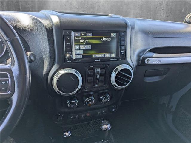 used 2014 Jeep Wrangler Unlimited car, priced at $18,991