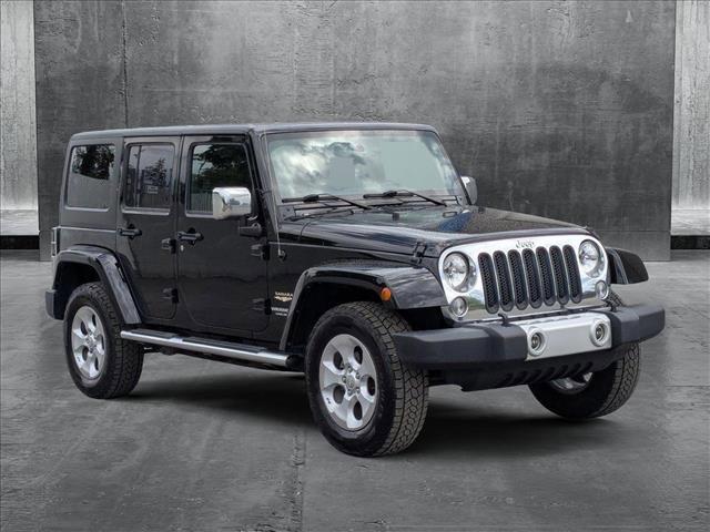 used 2014 Jeep Wrangler Unlimited car, priced at $19,991