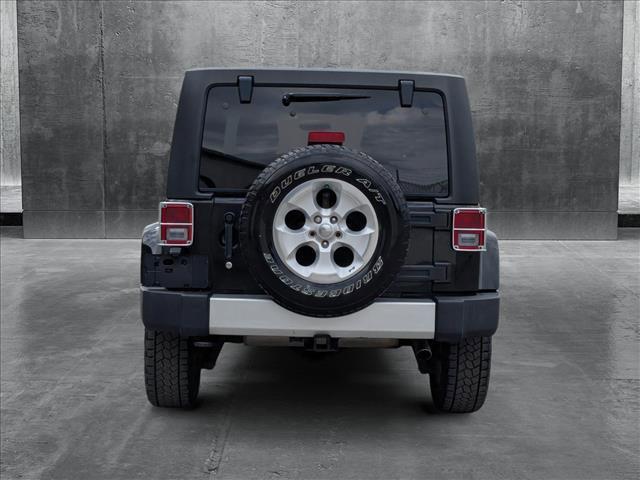 used 2014 Jeep Wrangler Unlimited car, priced at $19,991