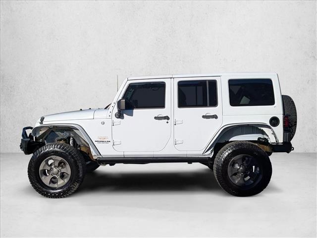 used 2014 Jeep Wrangler Unlimited car, priced at $17,981