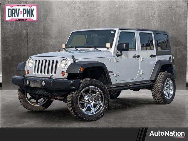 used 2011 Jeep Wrangler Unlimited car, priced at $16,343