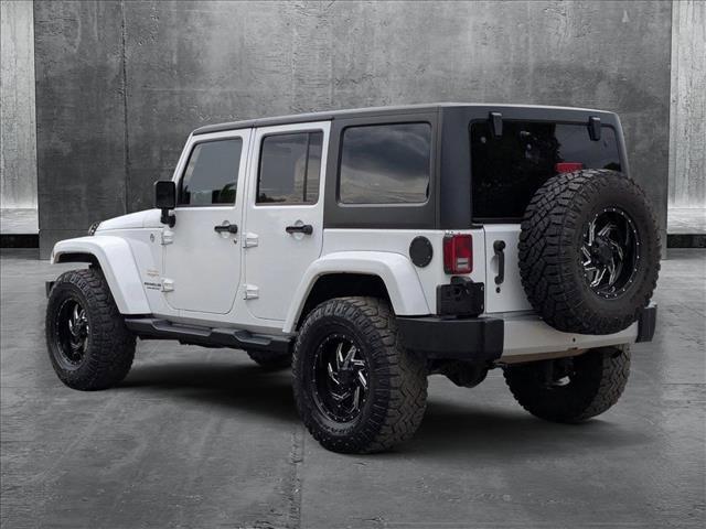 used 2014 Jeep Wrangler Unlimited car, priced at $16,995