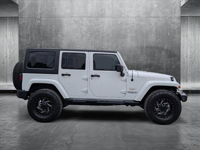 used 2014 Jeep Wrangler Unlimited car, priced at $16,995