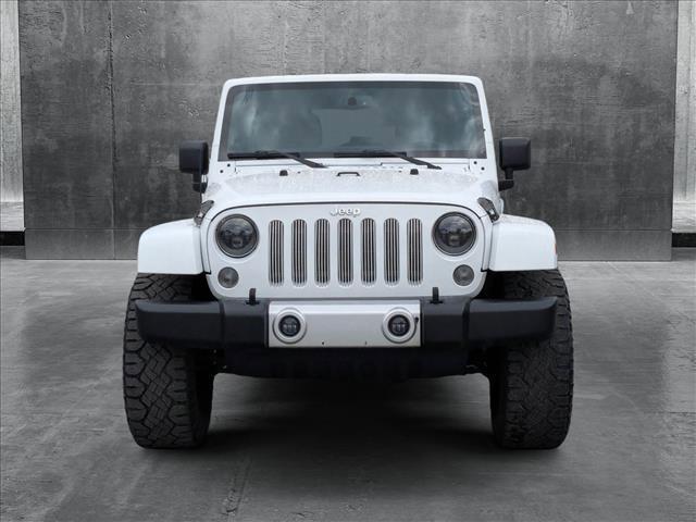 used 2014 Jeep Wrangler Unlimited car, priced at $16,995