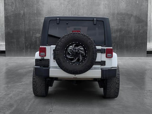 used 2014 Jeep Wrangler Unlimited car, priced at $16,995