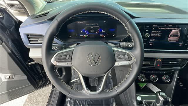 used 2023 Volkswagen Taos car, priced at $21,595