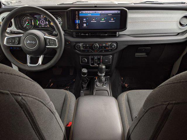 used 2024 Jeep Wrangler 4xe car, priced at $32,995