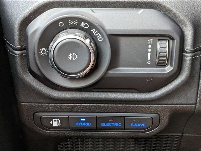 used 2024 Jeep Wrangler 4xe car, priced at $34,389