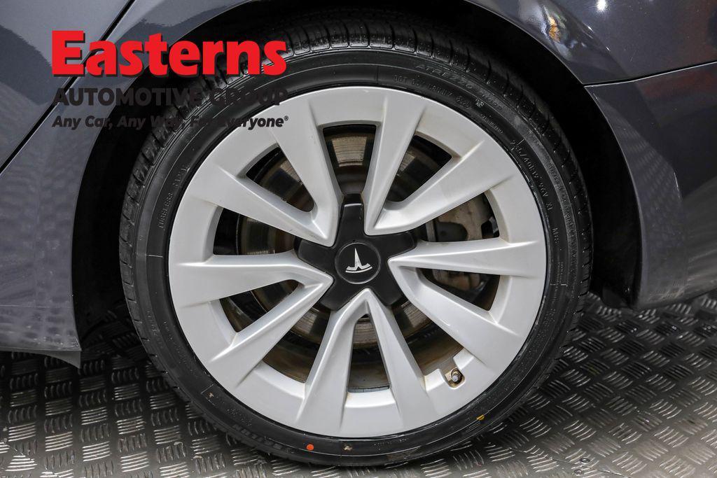 used 2023 Tesla Model 3 car, priced at $24,175