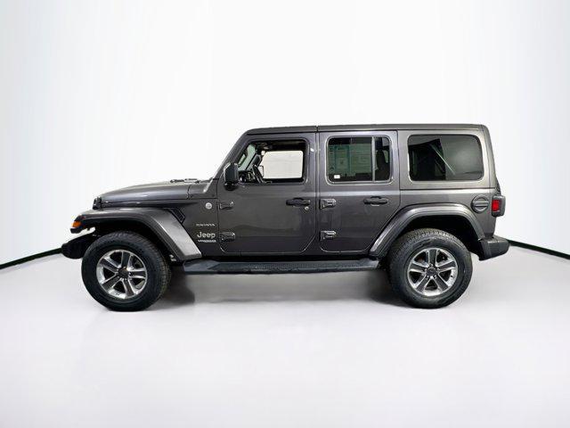 used 2021 Jeep Wrangler Unlimited car, priced at $37,259