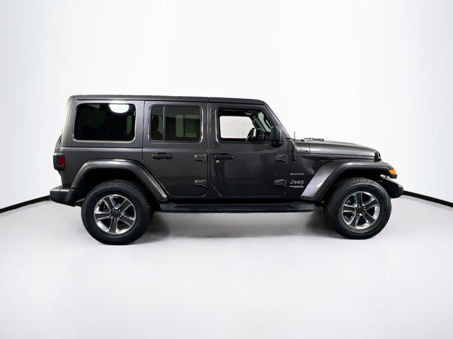 used 2021 Jeep Wrangler Unlimited car, priced at $37,259