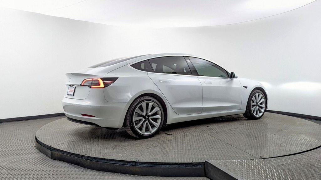 used 2018 Tesla Model 3 car, priced at $16,099