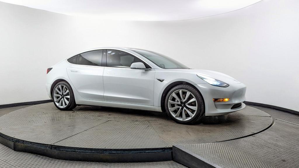 used 2018 Tesla Model 3 car, priced at $15,499