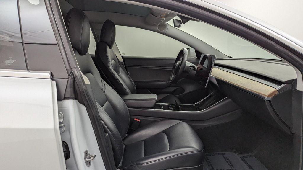 used 2018 Tesla Model 3 car, priced at $16,099