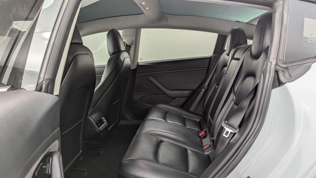 used 2018 Tesla Model 3 car, priced at $15,499