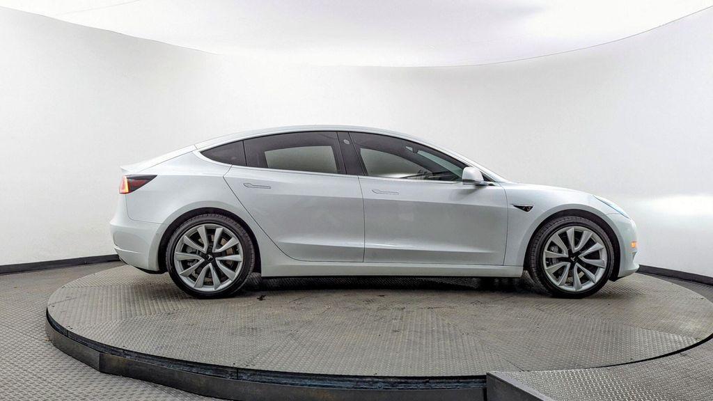 used 2018 Tesla Model 3 car, priced at $16,099