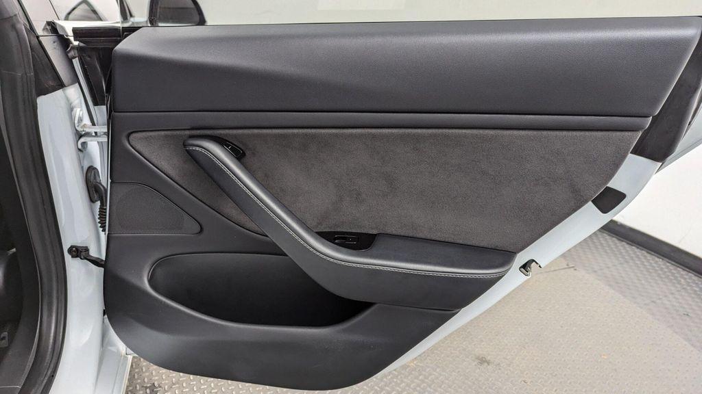 used 2018 Tesla Model 3 car, priced at $16,099