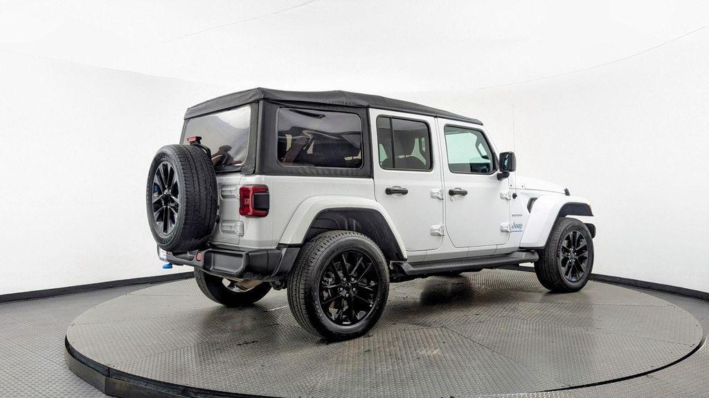 used 2023 Jeep Wrangler 4xe car, priced at $25,299