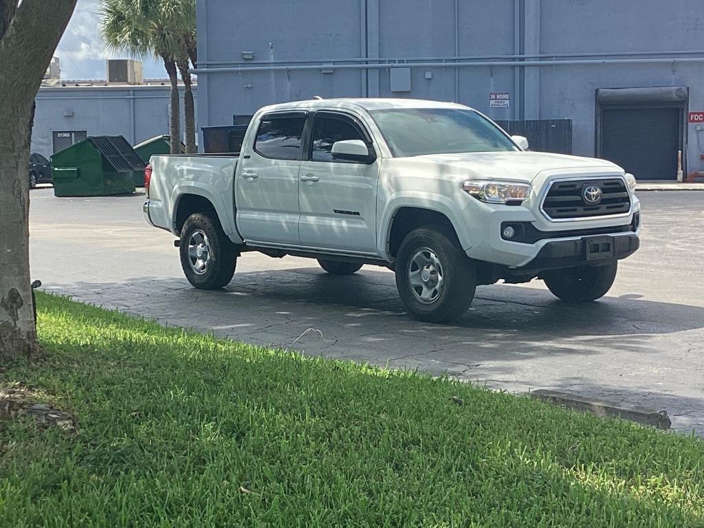 used 2019 Toyota Tacoma car, priced at $23,299