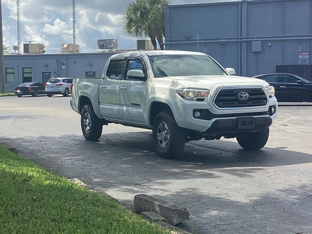 used 2019 Toyota Tacoma car, priced at $23,299