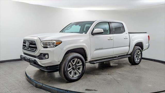 used 2019 Toyota Tacoma car, priced at $23,999