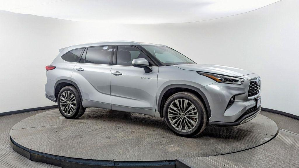 used 2021 Toyota Highlander Hybrid car, priced at $33,499