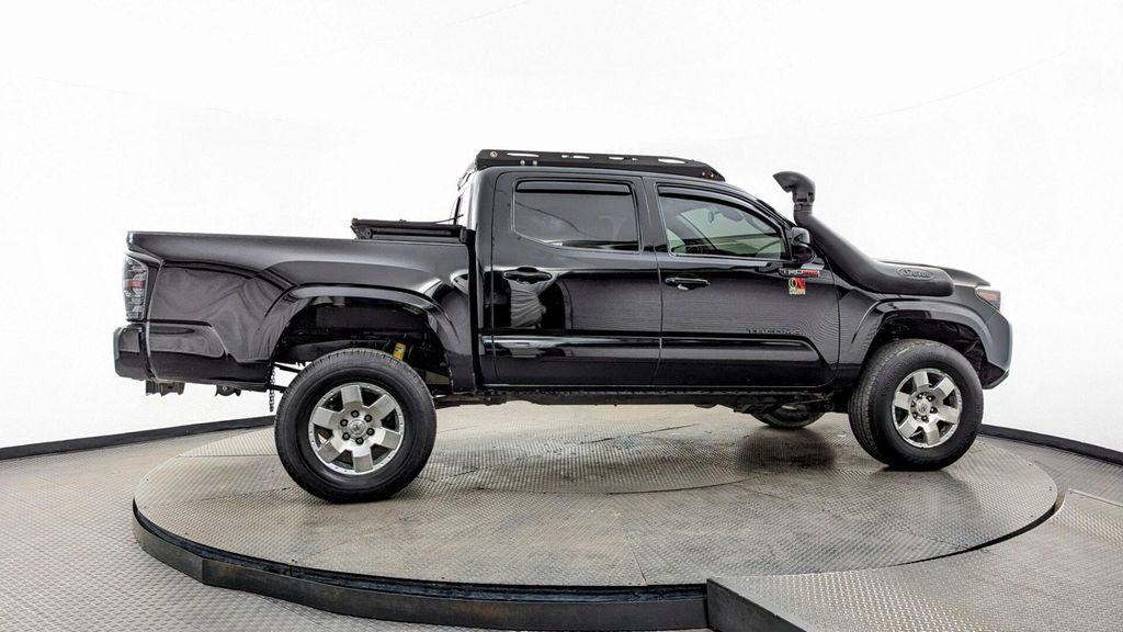 used 2023 Toyota Tacoma car, priced at $29,599