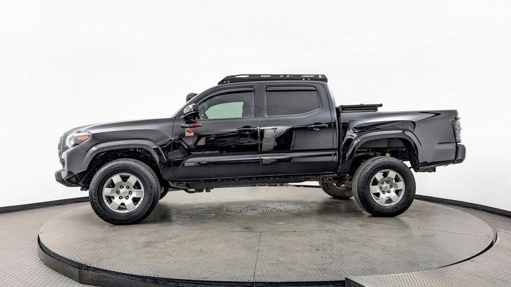 used 2023 Toyota Tacoma car, priced at $29,599