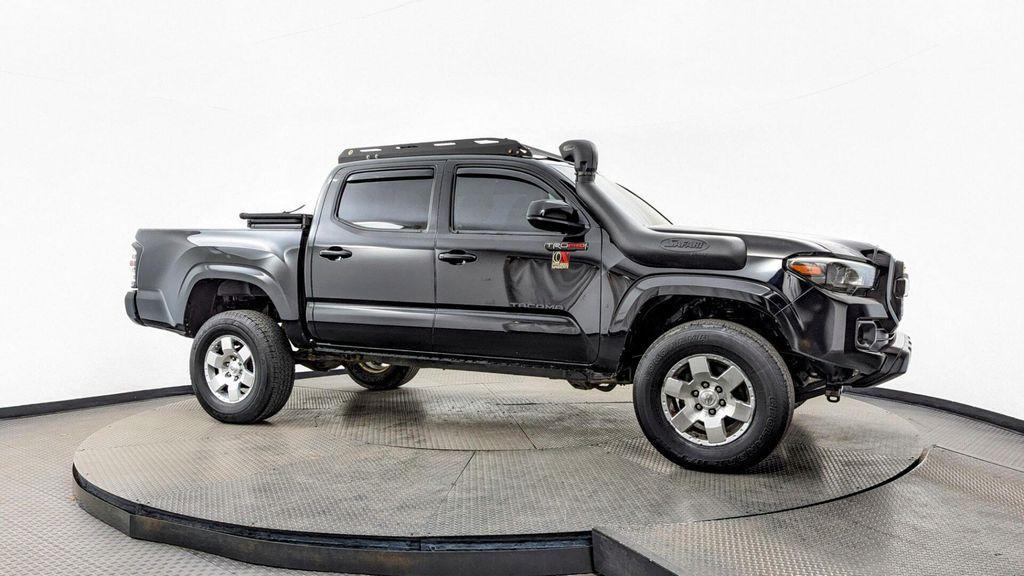 used 2023 Toyota Tacoma car, priced at $29,599