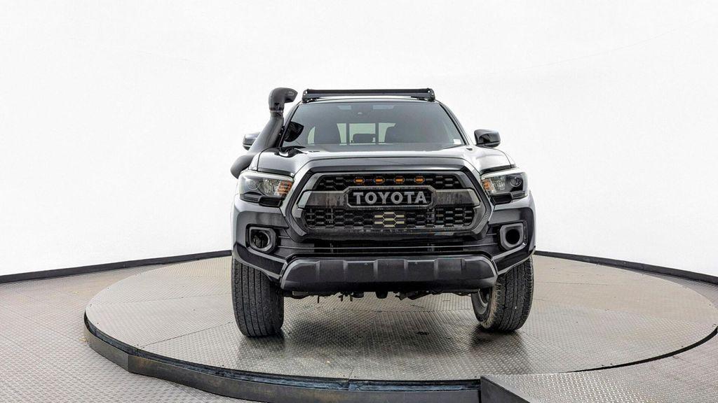 used 2023 Toyota Tacoma car, priced at $29,599
