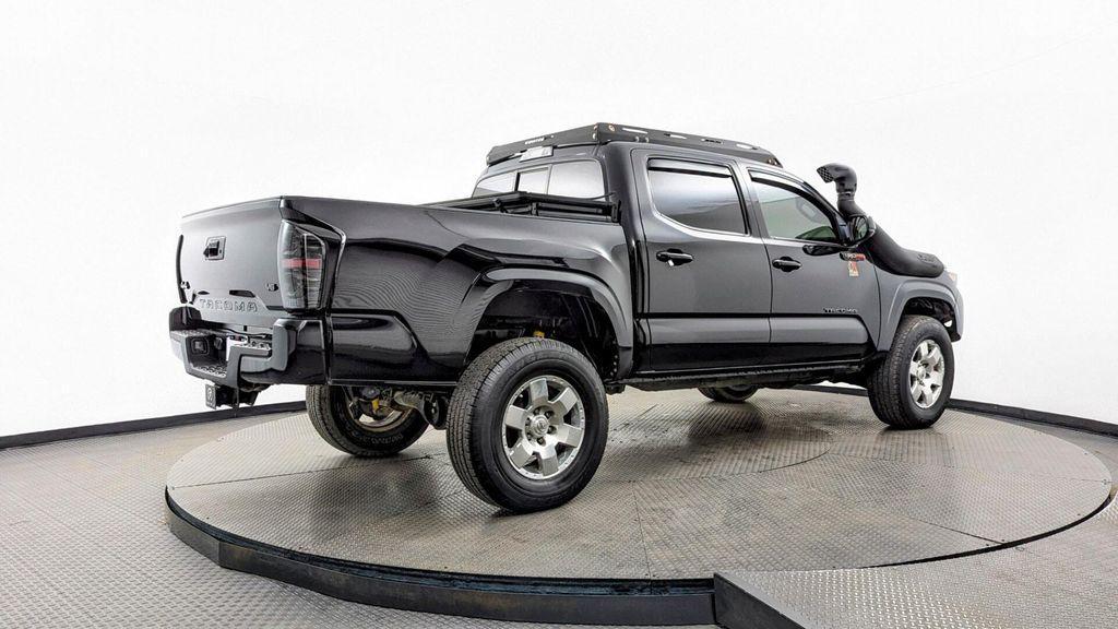 used 2023 Toyota Tacoma car, priced at $29,599