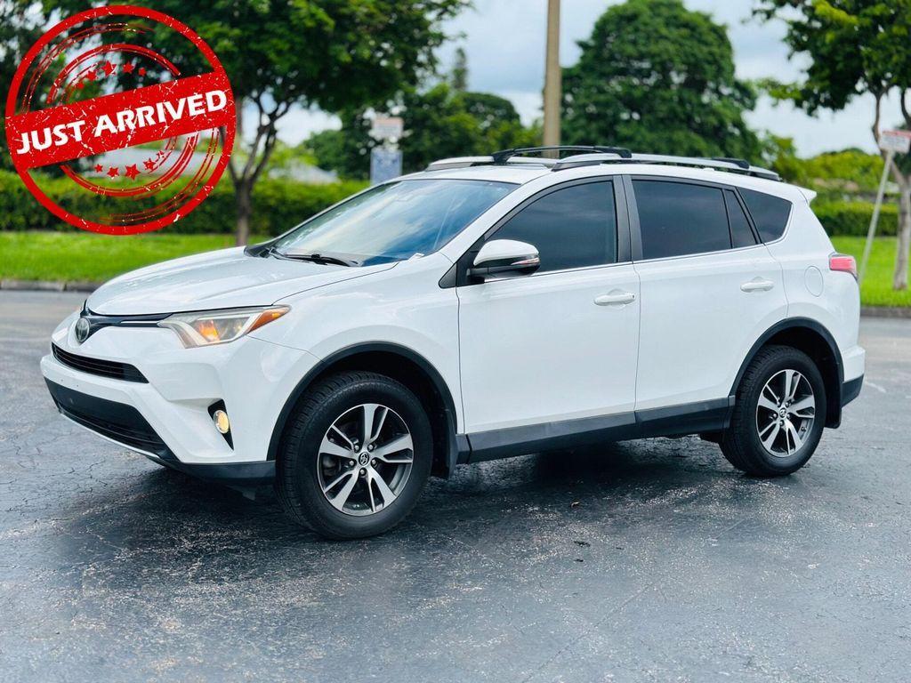 used 2018 Toyota RAV4 car, priced at $15,299