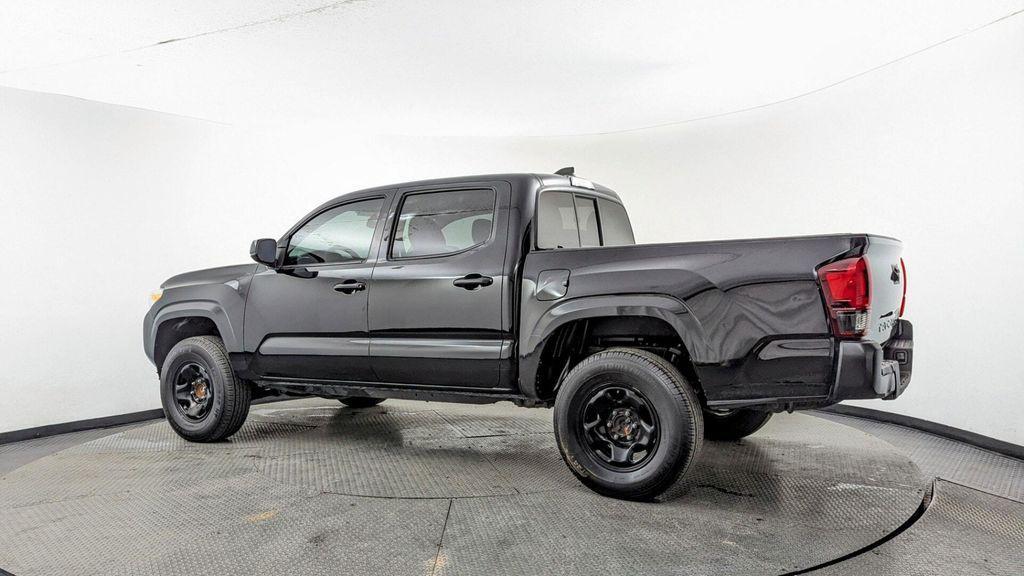 used 2021 Toyota Tacoma car, priced at $22,299