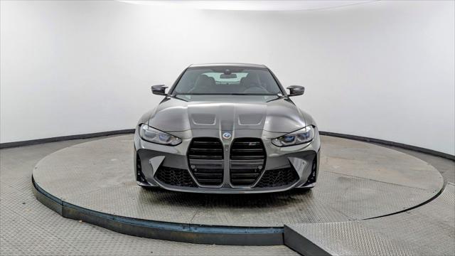 used 2023 BMW M4 car, priced at $69,899