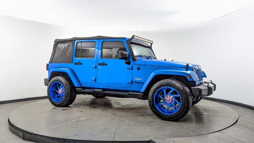 used 2015 Jeep Wrangler Unlimited car, priced at $16,897